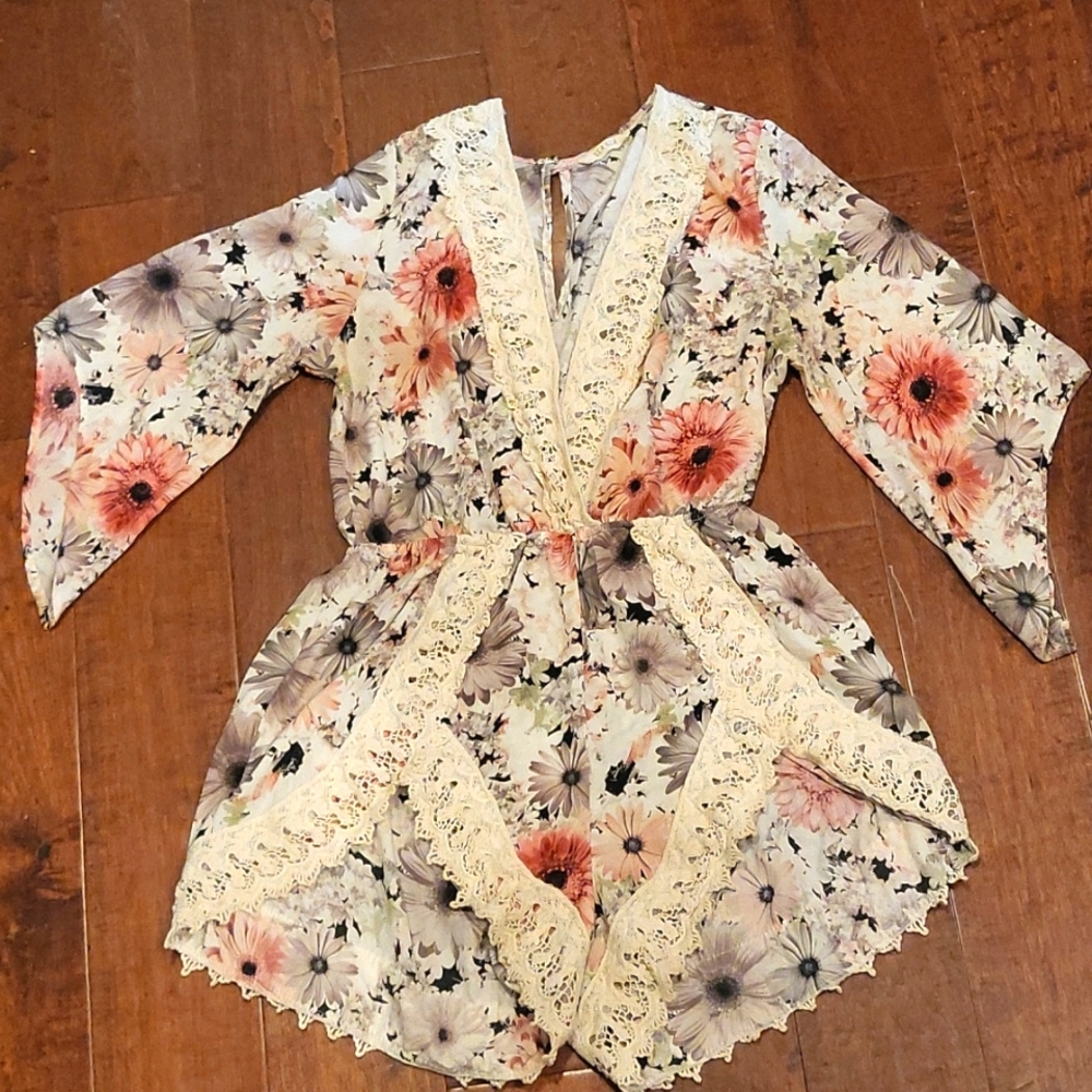 Floral Romper high cut thigh and low v-neck